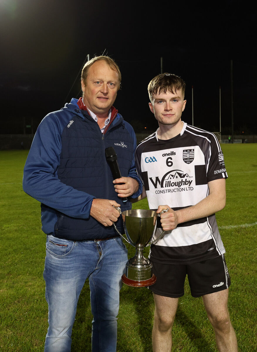  Peter Watson, Chairperson Rebel Og presents the Cup to DJ Foley, Donoughmore. Picture: Jim Coughlan.