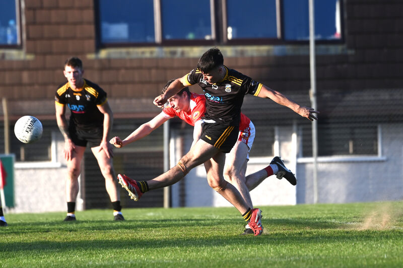 Darragh Daly, Fermoy,  gets a shot away under pressure in the final minutes. Picture: Larry Cummins