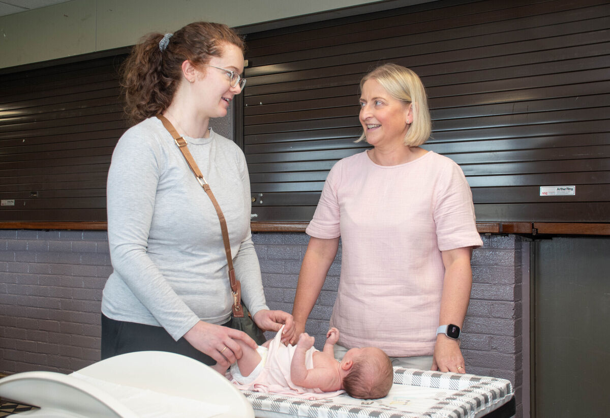 Claire and baby Cara McGrath getting some advice from PHN Vicky Fitzgerald during one of the recent Breastfeeding Support Group meeting in Midleton. Picture: Howard Crowdy