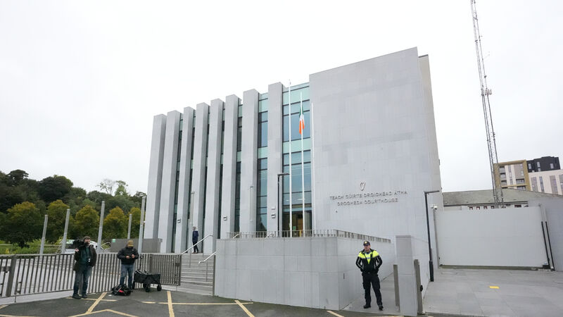 Man charged with murder of his parents and brother in Co Louth