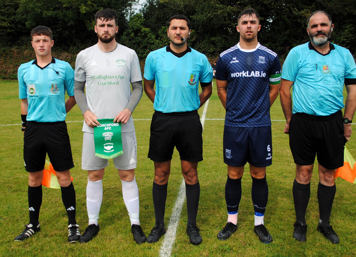 Referee Harun Uzkan (centre) is flanked by Coachford's Mark Murphy (left) and Villa FC's Luke Walsh. Also in picture are Ryan McCann and Bobby Coonan.