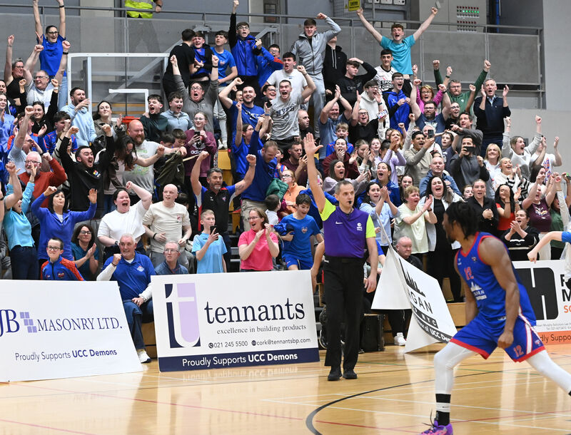 UCC Demons' Patrick Robinson celebrates with the supporters after the win over Garvey Tralee Warriors in the Men's Super League semi-final at the Mardyke Arena Picture: Eddie O'Hare