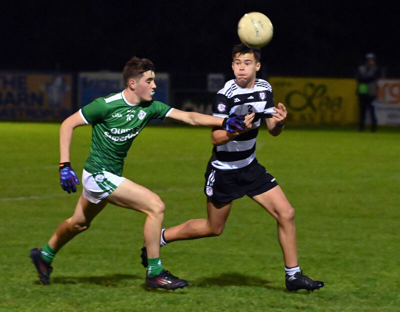 Midleton's Liam Cronin gets off his pass from Ballincollig's Cal McCarthy. Picture: Eddie O'Hare