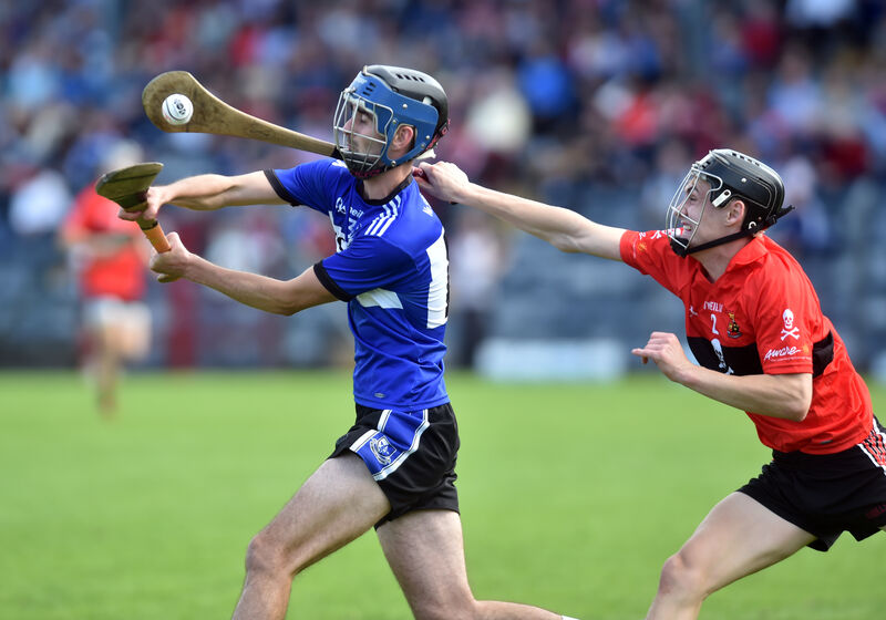 UCC's Eoghan Clifford tackles Sarsfields' Luke Hackett in 2018. Picture: Eddie O'Hare