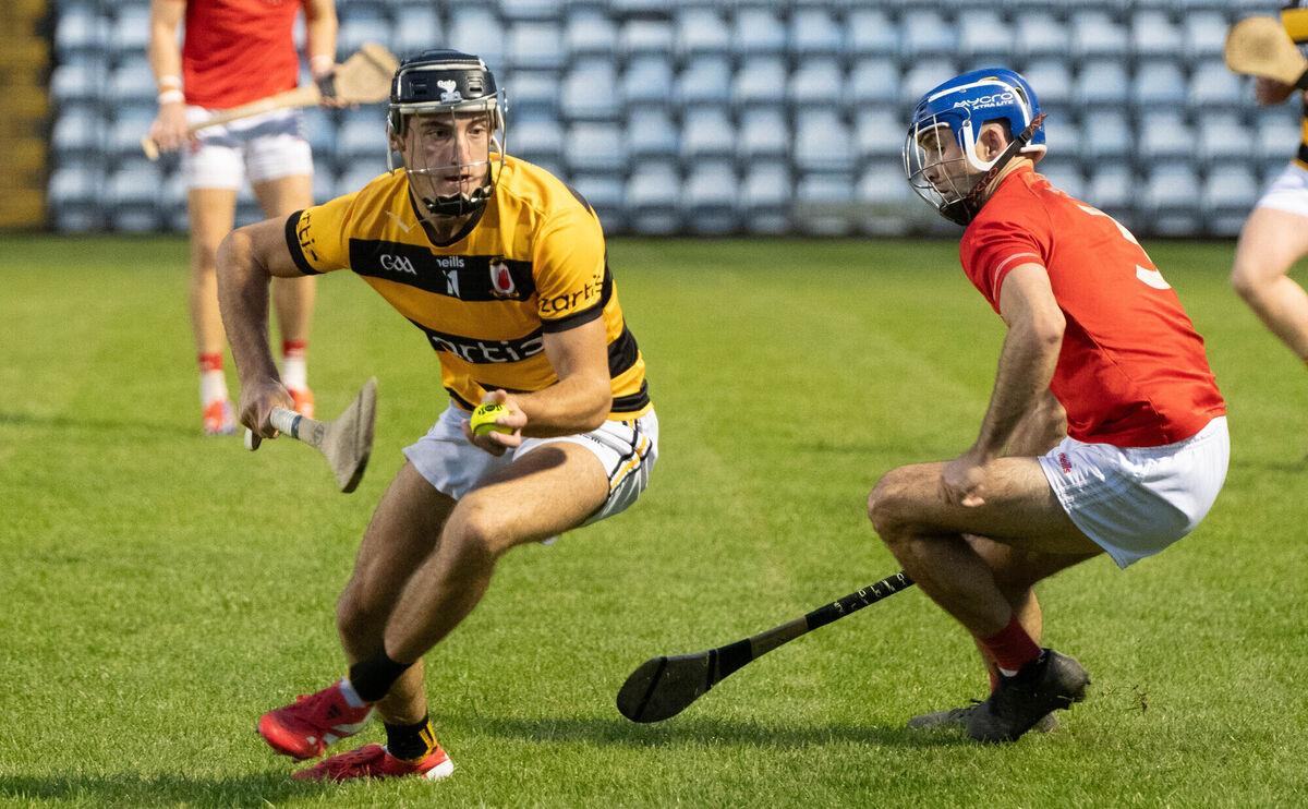 DJ Coffey of Na Piarsaigh turns away from Blarney's Sean Crowley during the recent SAHC quarter-final at Páirc Uí Rinn. Picture: Howard Crowdy