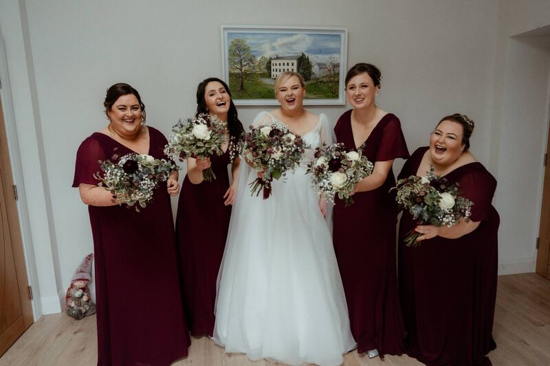Alyson pictured with her bridesmaids on the wedding day. The couple were thrilled to have their friends and family by their sides.
