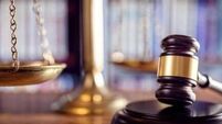 Gavel, scales of justice and law books