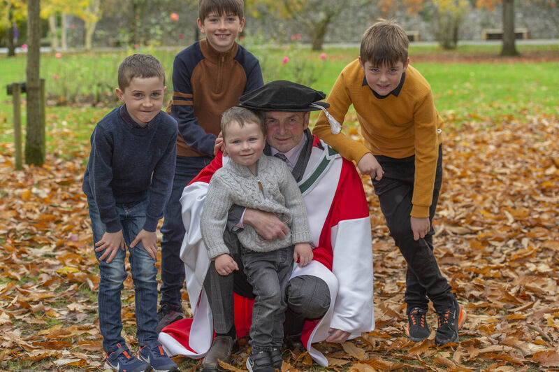 Don O’Leary, pictured with his grandsons James, Daniel, Eoin and Cian, when he received an Honorary Degree of Doctor of Arts at UCC in 2021. Picture: Michael Mac Sweeney/Provision