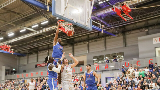 <p> UCC Demons' Shariff Black dunks the ball against Energywise Ireland Neptune at the Mardyke Arena. Picture: David Creedon</p>