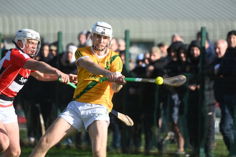  Jack Leahy, Dungourney, strikes against a strong wind in the first half. Picture: Larry Cummins