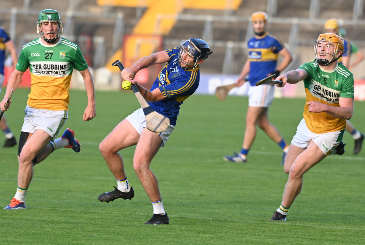 Carrigtwohill's Laim Gosnell shoots from Bride Rovers' Conor Hazelwood. Picture; Eddie O'Hare Carrigtwohill's Laim Gosnell shoots from Bride Rovers' Conor Hazelwood. Picture; Eddie O'Hare