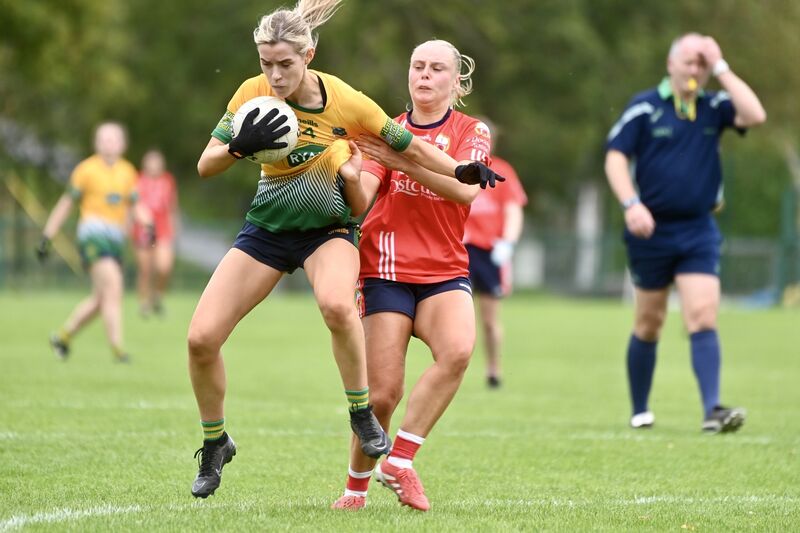  Evie Twomey with possession for Glanmire under pressure from Laura O’Mahony. Picture: Larry Cummins