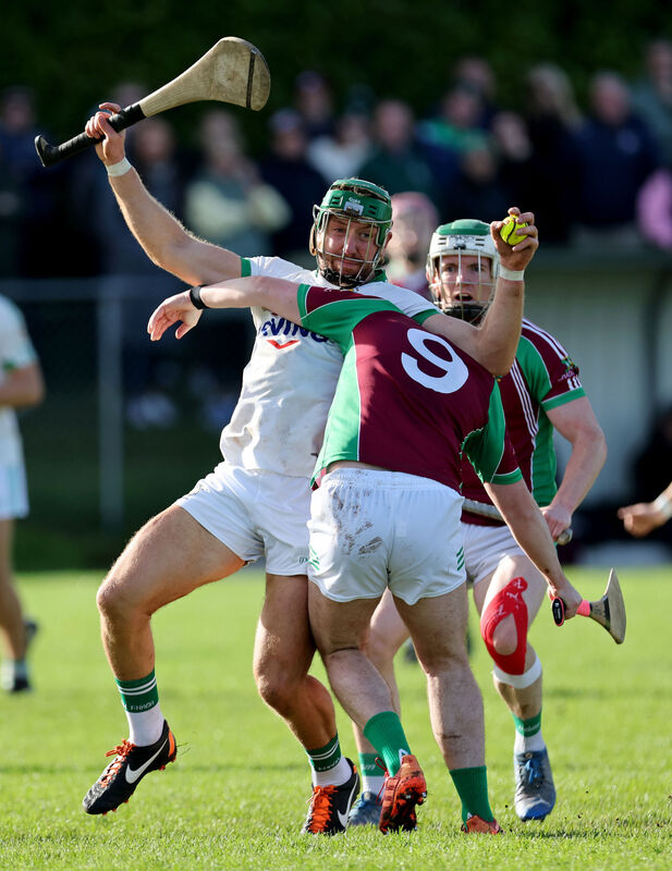  Cianie Furey, Aghabullogue, tries to get past William Leahy, Aghada. Picture: Jim Coughlan.