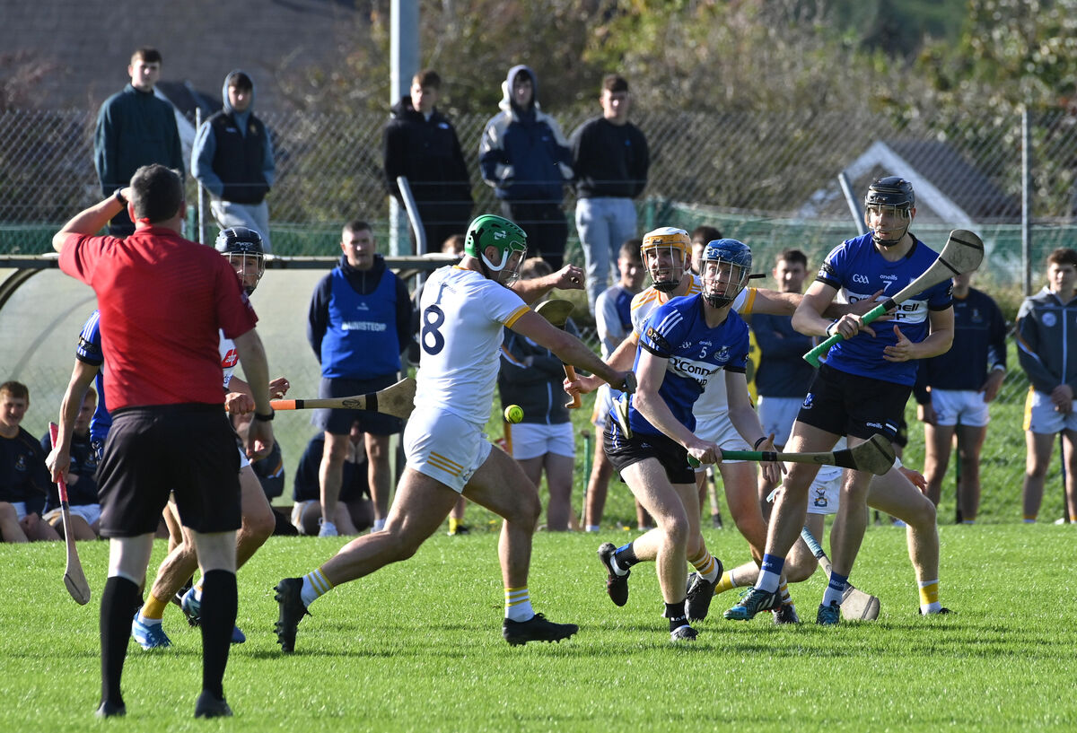  Sarsfields players John Leddy and Jack Leahy watching this breaking ball with Michael Cahalane, Bandon. Picture: Dan Linehan