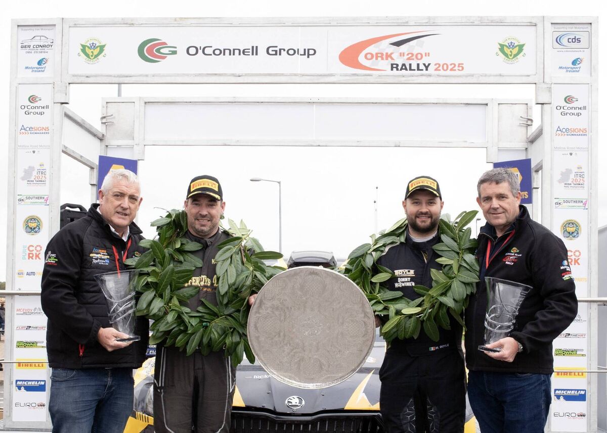 Donegal's Michael Boyle (right) and Dermot McCafferty (Skoda Fabia RS Rally2) celebrate their victory in the O'Connell Group Cork 20 Rally, the final round of the NAPA Auto Parts Irish Tarmac Rally Championship. Also included are (left) Paul Browne (Deputy Clerk of the Course) and Kevin O'Riordan (extrreme right) Clerk of the Course. Picture: Martin Walsh.