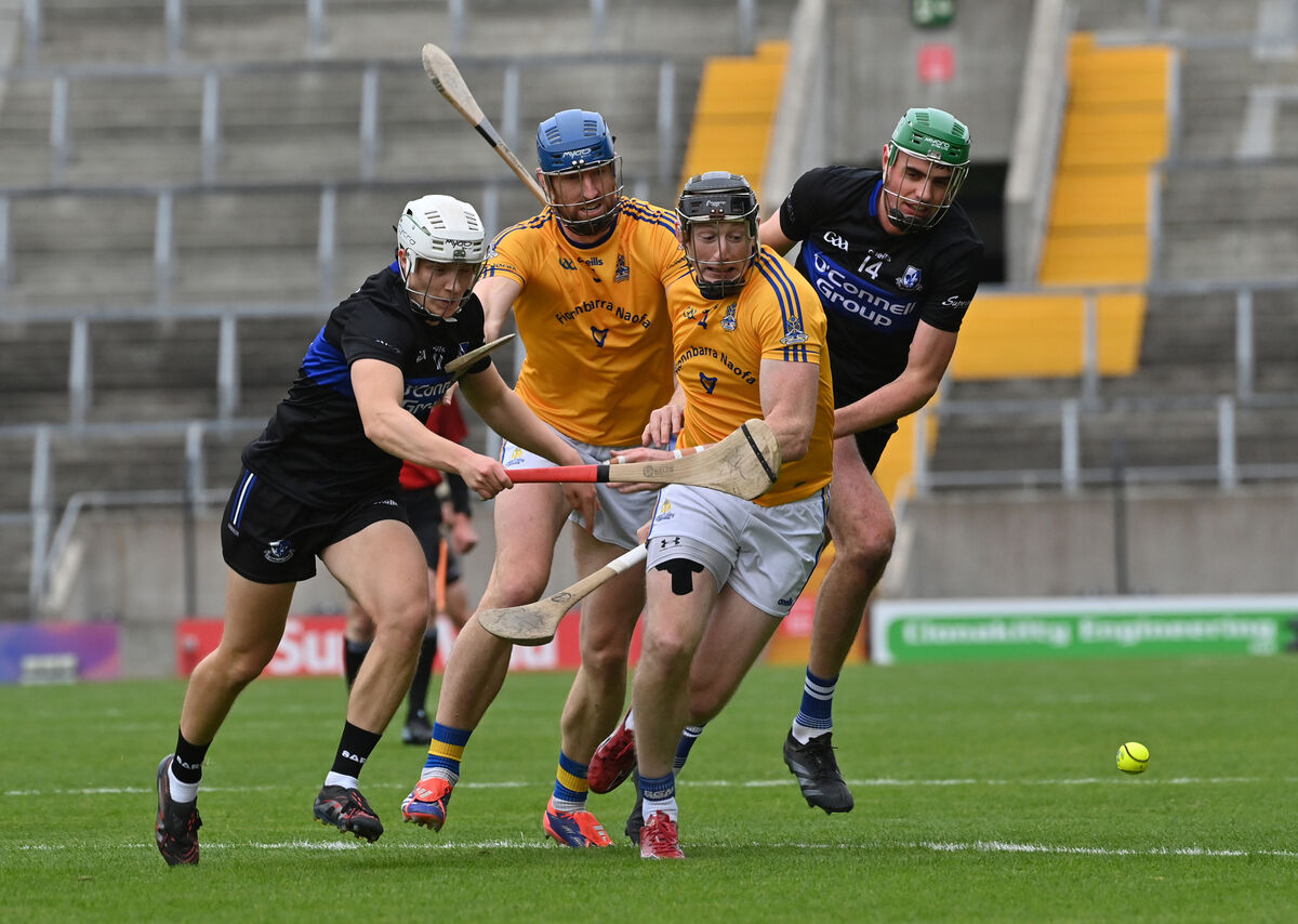  Sarsfields pair Colm McCarthy and James Sweeney fighting for this breaking ball with Jamie Burns and Damien Cahalane of St Finbarr's during Sunday's Co-op SuperStores Premier SHC semi-final at SuperValu Páirc Uí Chaoimh. Picture: Dan Linehan