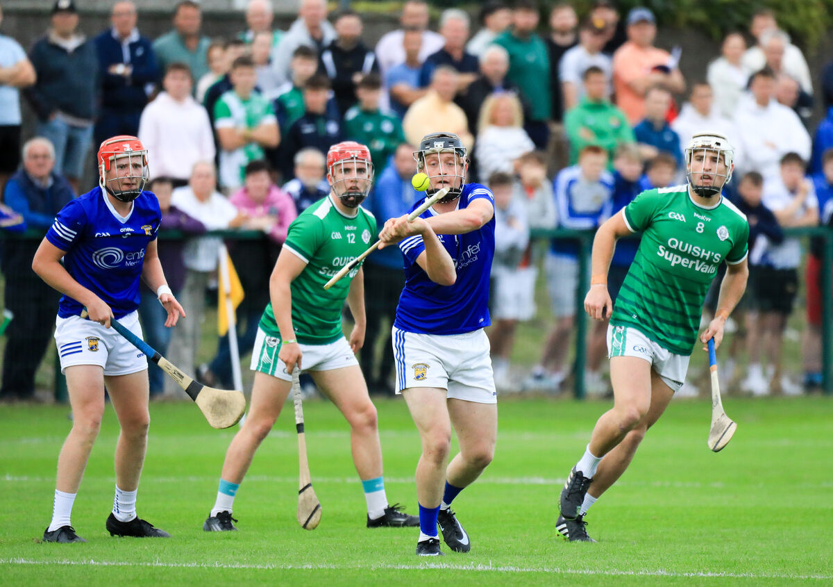 Ballinhassig's James O'Callaghan clears the ball out of defence against Brian Keating of Ballincollig back in August. Picture: David Creedon