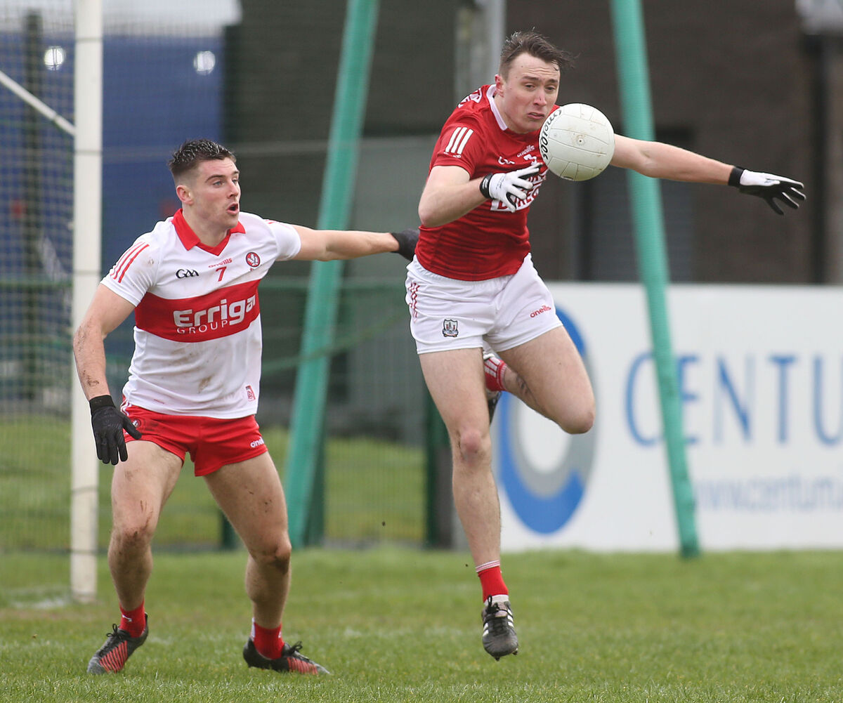 Cork’s Seán Meehan wins the ball from Derry's Conor Doherty in 2022. Picture: INPHO/Lorcan Doherty