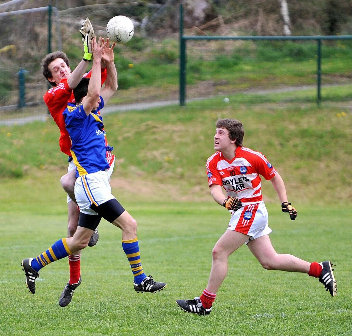 Adrigole goalkeeper William O'Sullivan knocks the ball away from Ballydesmond's Niall Fleming in 2013. Picture: David Keane