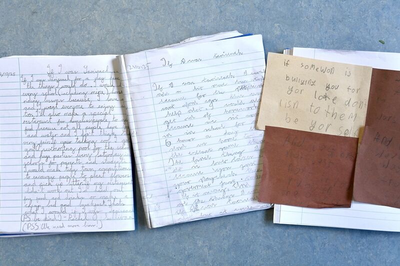  Copybooks with notes prepared by third class pupils at Scoil Nioclais, Frankfield on being Taoiseach for Budget 2026. 