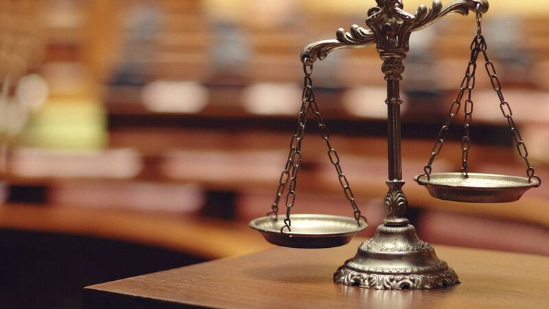 Two men charged over alleged burglary and theft at Cork apartment 