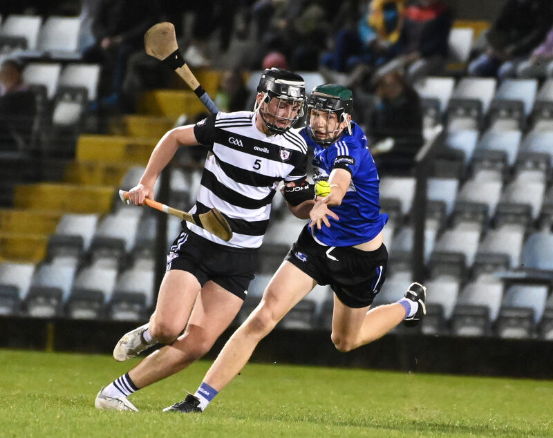 Midleton's Max Murphy gathers the sliothar, under ressure for  from Sarsfields' Eoin Considine during the Rebel Óg Premier 1 minor HC final at Páirc Uí Rinn. Picture; Eddie O'Hare