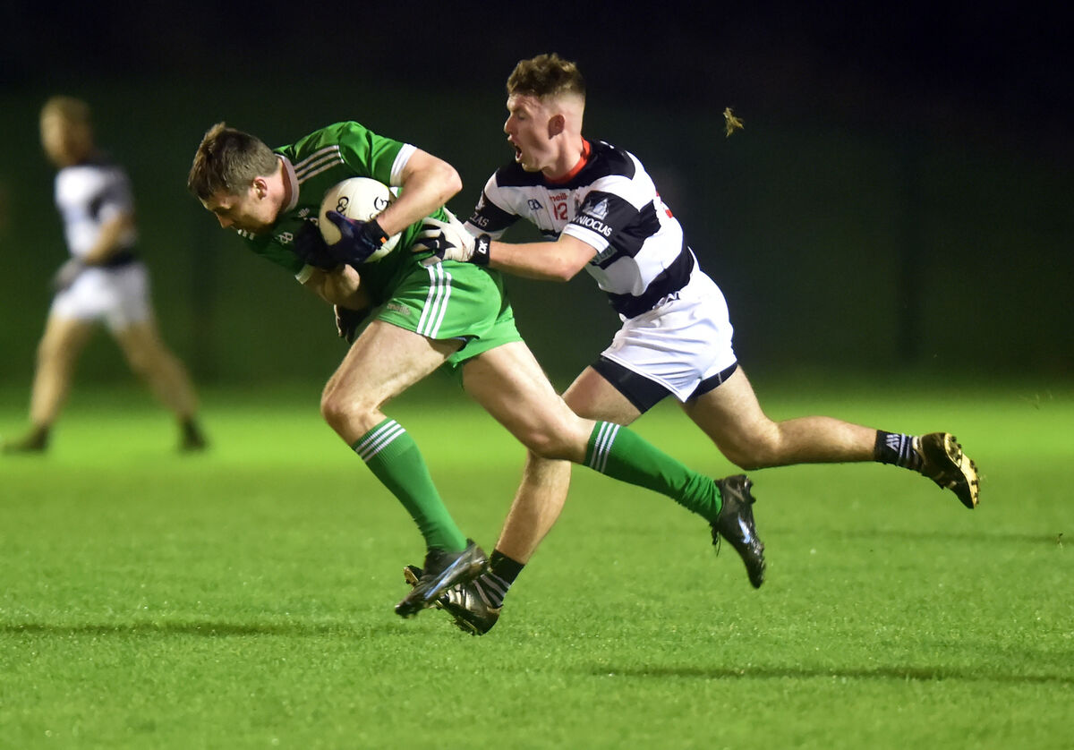 Macroom's Seán Kiely is tackled by St Nick's Danny Morris in 2021. Picture: Eddie O'Hare