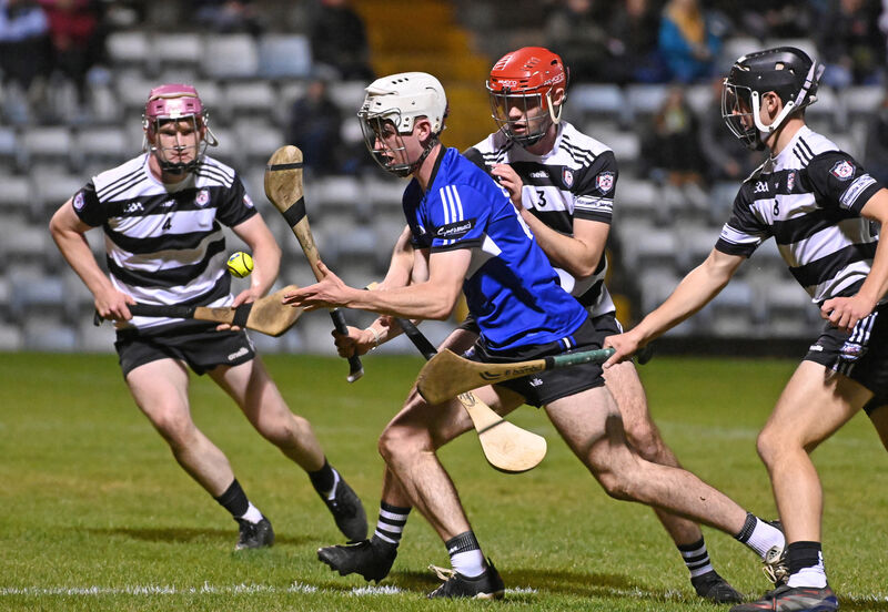 Sarsfields' Finn O'Connor tackled by Midleton's Eoin Ahern, Lochlann Stewart and Braden Dunlea. Picture: Eddie O'Hare Sarsfields' Finn O'Connor tackled by Midleton's Eoin Ahern, Lochlann Stewart and Braden Dunlea. Picture: Eddie O'Hare