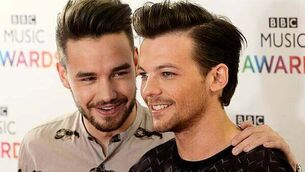 Louis Tomlinson says bandmate Niall Horan told him of Liam Payne’s death