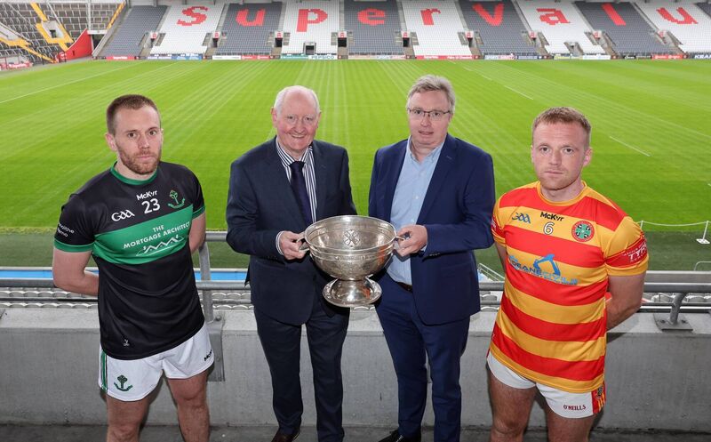 Pat Horgan, chairperson of Cork GAA, and Brendan Harrington, McCarthy Insurance Group CEO, with Alan O'Donovan of Nemo Rangers and Luke Meade of Newcestown. Picture: Jim Coughlan