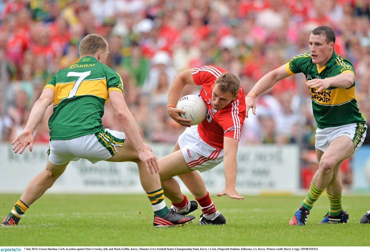 Mark Griffin playing for Kerry against Cork - and future Éire Óg club colleague Ciarán Sheehan - in the 2013 Munster SFC final at Fitzgerald Stadium. Picture: Barry Cregg/Sportsfile