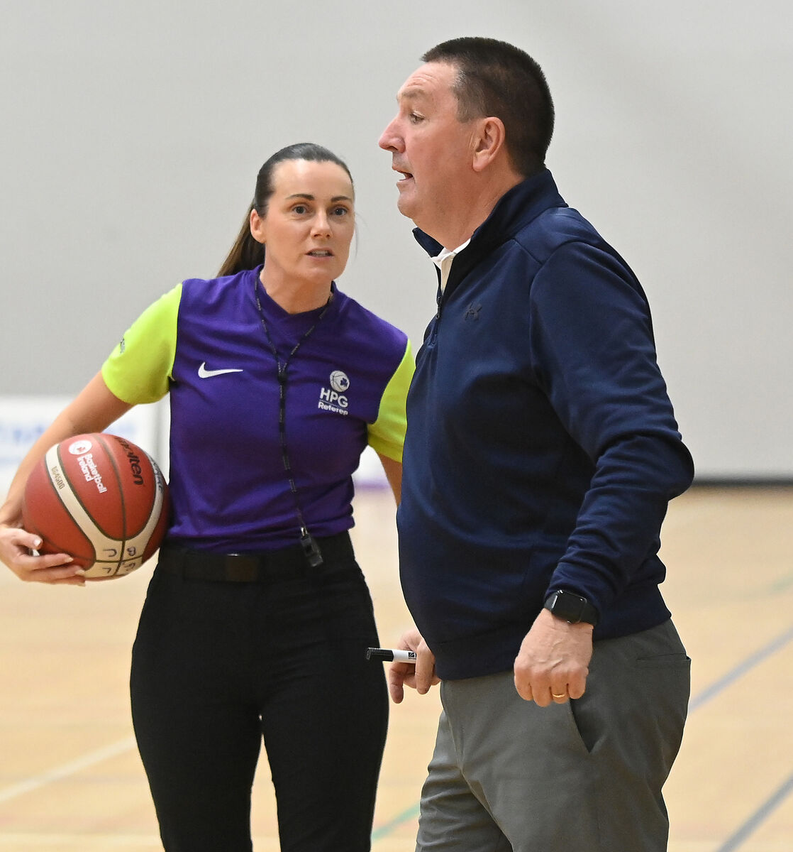 UCC Glanmire's head coach Mark Scannell with referee Emer Buckley.. Picture: Eddie O'Hare