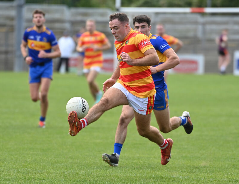 Newcestown's Jack Meade breaks from Carrigaline's Darragh King during the McCarthy Insurance Group Cork Premier SFC quarter-final at Páirc Uí Rinn. Picture: Eddie O'Hare Newcestown's Jack Meade breaks from Carrigaline's Darragh King during the McCarthy Insurance Group Cork Premier SFC quarter-final at Páirc Uí Rinn. Picture: Eddie O'Hare