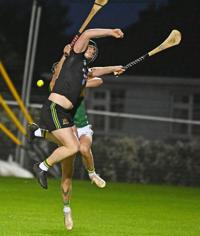 Glen Rovers' Kenneth McCarthy goes high with Cloughduv's Eoghan Clifford. Picture: Eddie O'Hare Glen Rovers' Kenneth McCarthy goes high with Cloughduv's Eoghan Clifford. Picture: Eddie O'Hare