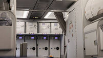 Rear end Inside a commercial airplane in the economy class