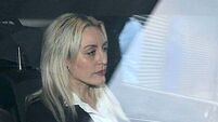 Woman (45) accused of murdering two men asked about taking boat out where bodies were found