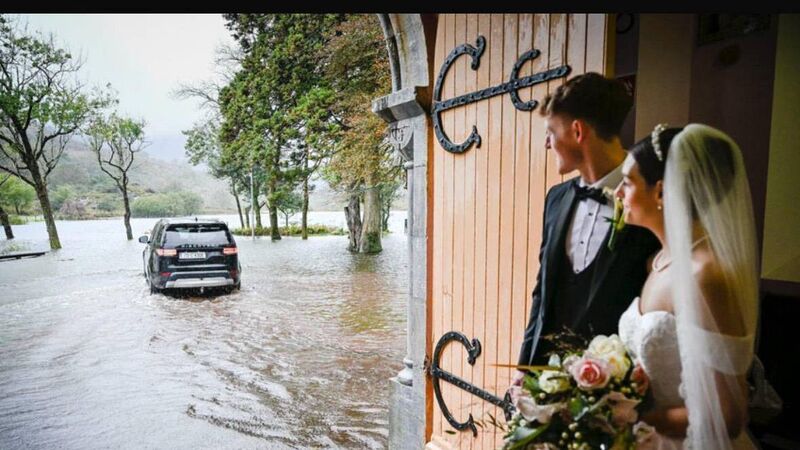 'Under two foot of water': Couple marry in Cork despite 'epic flooding' caused by Storm Amy