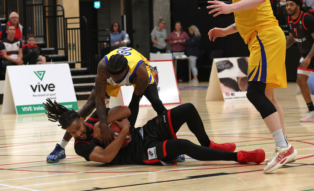  Latavious Mitchell, Ballincollig, battles Jaylyn Richardson, St Vincent's, in the Men's Super League Basketball at the MTU Arena. Picture: Jim Coughlan.