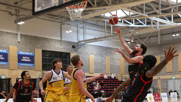 <p> Colm Blount, Ballincollig, rises to the hoop. Picture: Jim Coughlan.</p>