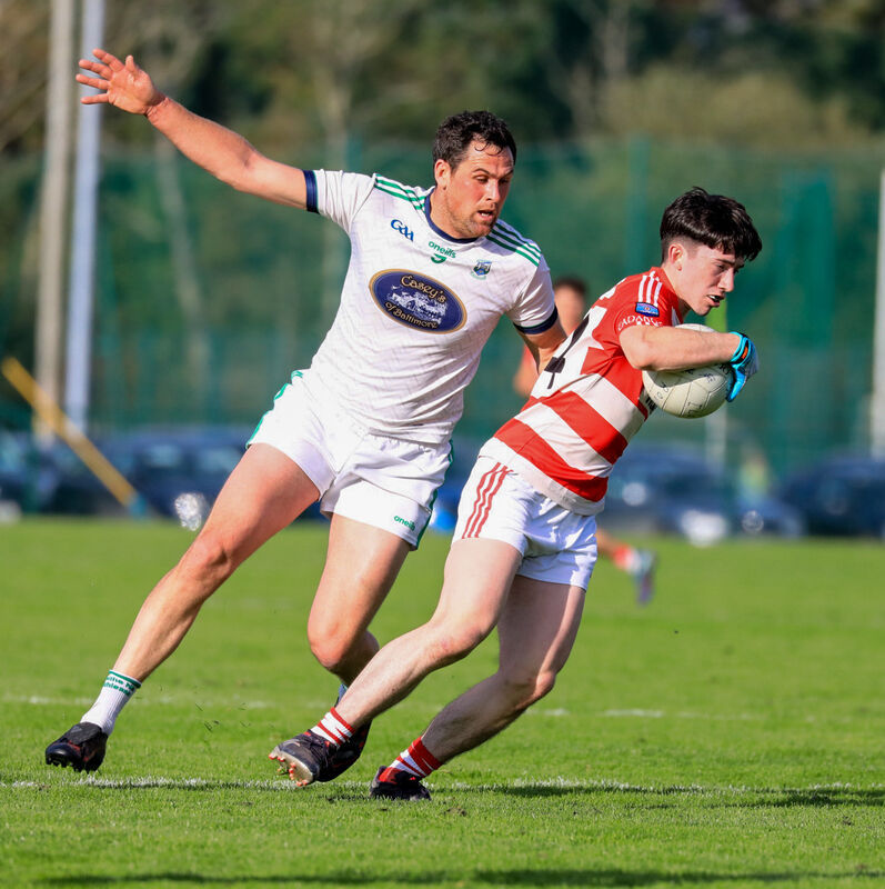 Adrigole's Ger O'Shea takes on Ilen Rovers' Peadar O'Driscoll. Picture: Anne Marie Cronin Photography 