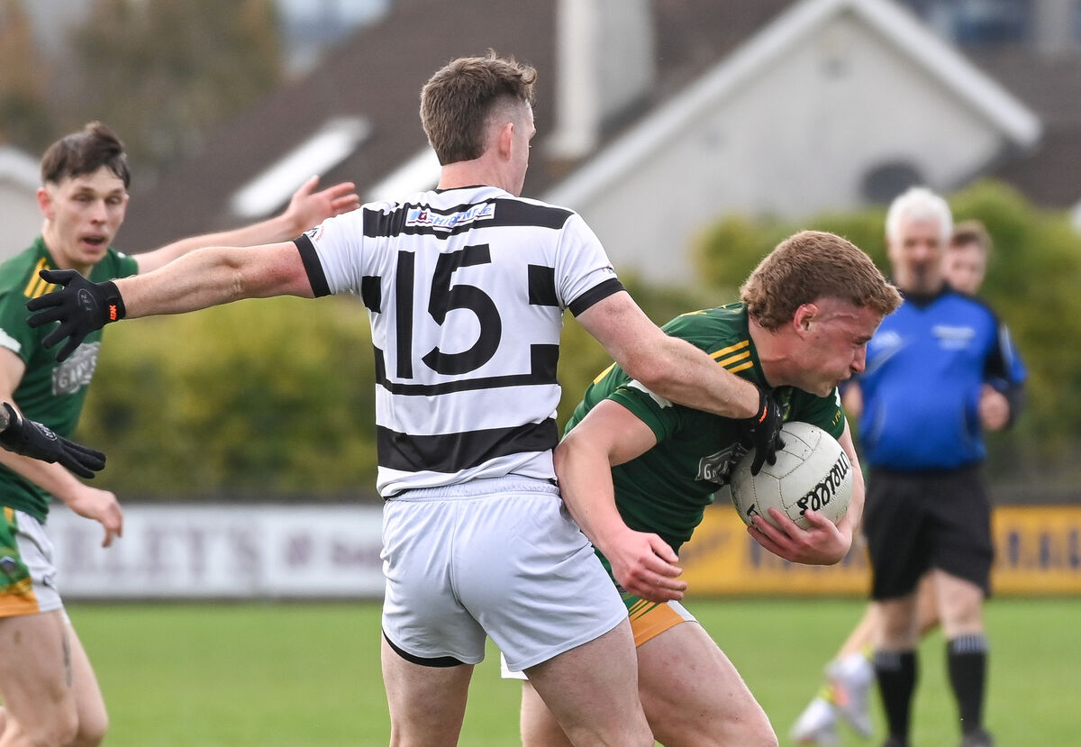  Cobh's Ben Geary tries to get past St Nick's Danny Morris during their Premier JFC semi-final clash at Carrigtwohill. Picture: David Keane.