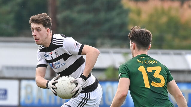 <p> St Nick's Robert Downey breaks out of defence past Cobh's Adam Lynch. Picture: David Keane.</p> <p> St Nick's Robert Downey breaks out of defence past Cobh's Adam Lynch. Picture: David Keane.</p>