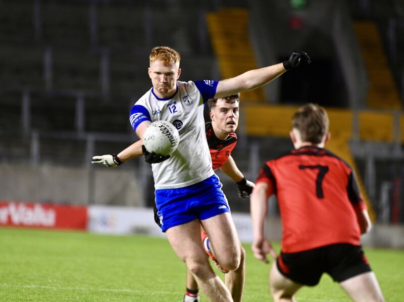  Micheal McSweeney kicks a point for Knocknagree against Béal Átha'n Ghaorthaidh. Picture: Larry Cummins