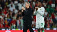 Heimir Hallgrímsson and Chiedozie Ogbene dejected after the game 11/10/2025