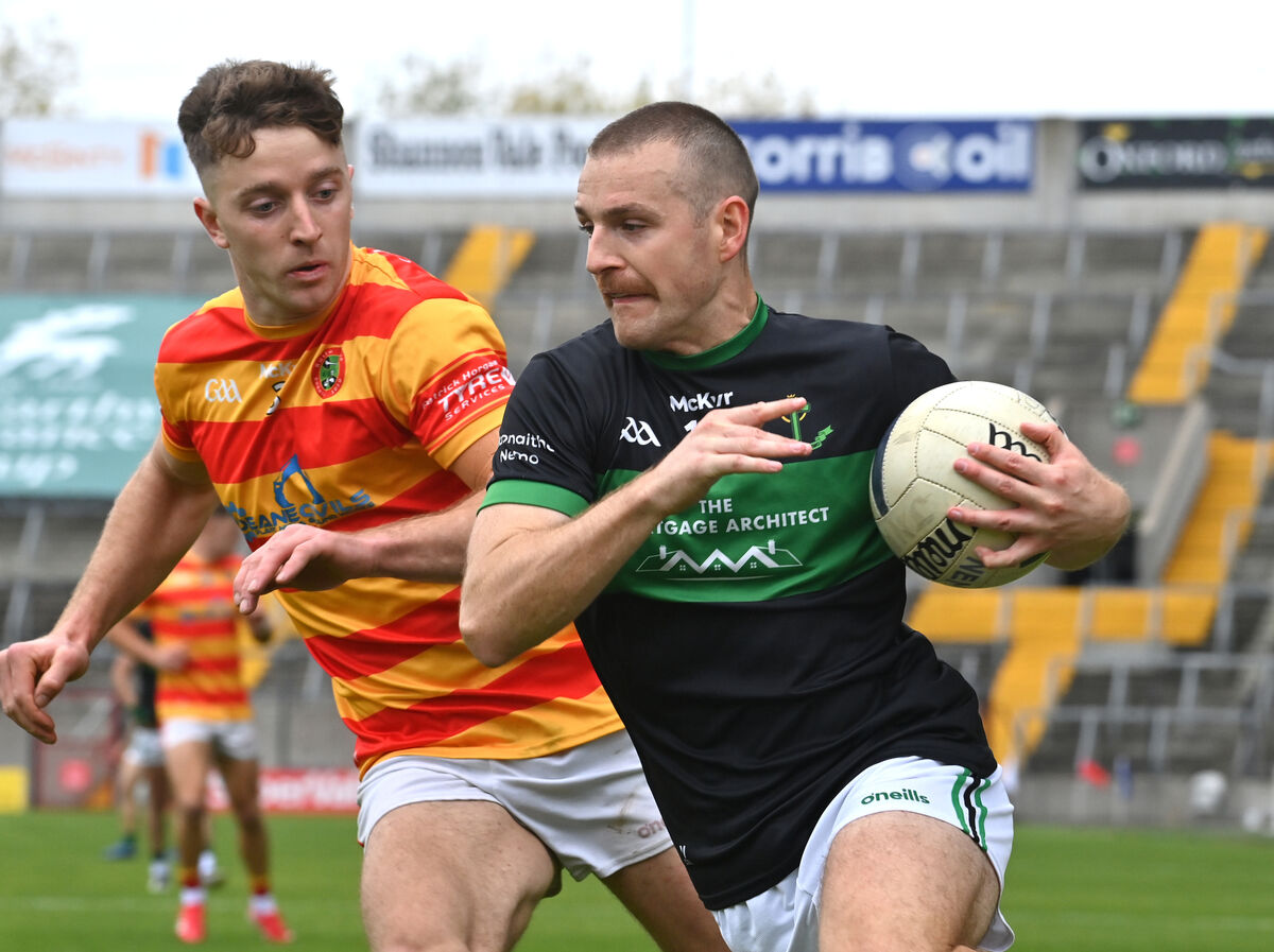  Conor Horgan of Nemo Rangers looking to break Newcestown's Colm O'Donovan. Picture: Dan Linehan