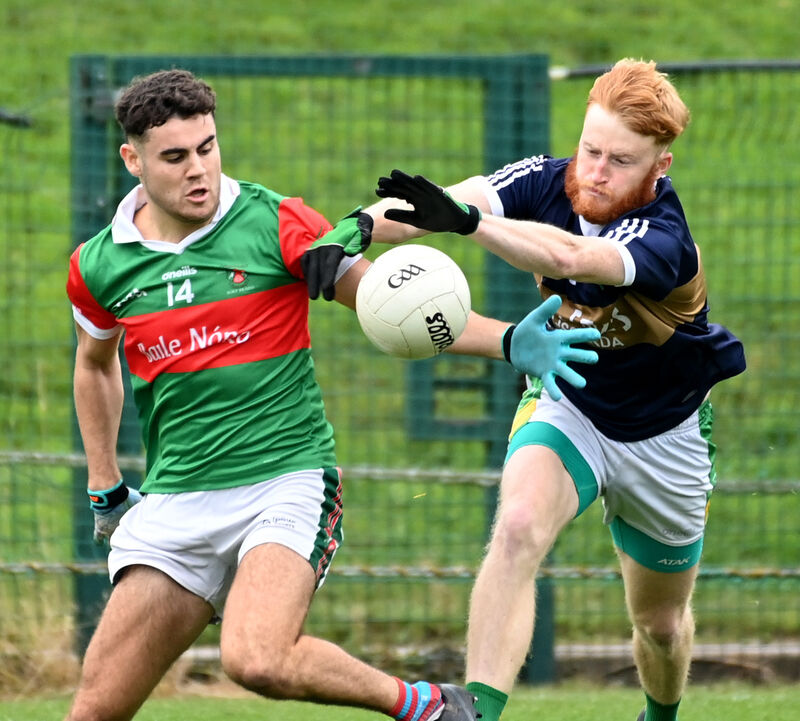 Kilmurry's William Ronan tackles Ballinora's Robert Quirke. Picture: Eddie O'Hare