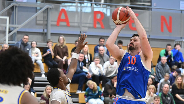 <p>UCC Demons' David Lehane lays up a basket from Flexachem Killorglin's Echezona Okeke during the Domino's Men's Super League at the Mardyke Arena. Picture: Eddie O'Hare</p>