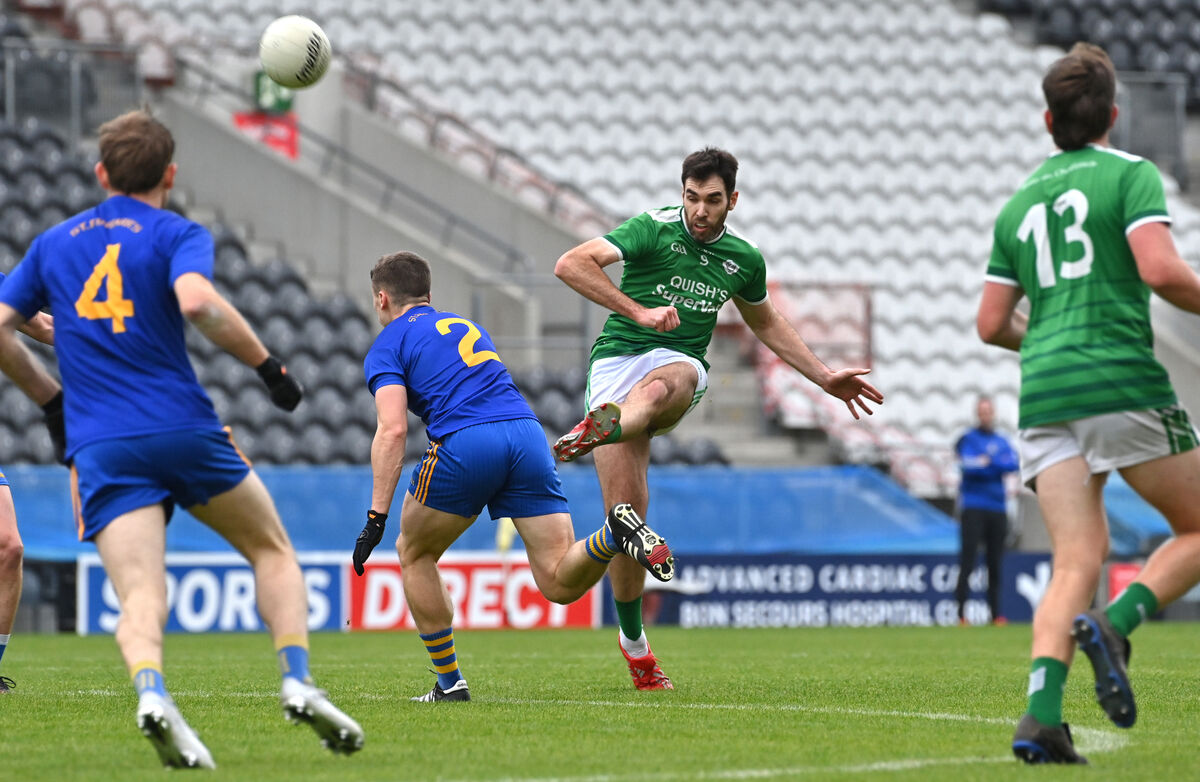 Seán Kiely of Ballincollig getting in a shot on goal watched by Billy Hennessy of St Finbarr's. Picture: Dan Linehan Seán Kiely of Ballincollig getting in a shot on goal watched by Billy Hennessy of St Finbarr's. Picture: Dan Linehan