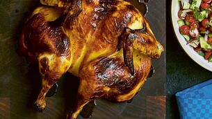 <p>Samin Nosrat's joojeh kabob roast chicken. Picture:  Aya Brackett/PA </p>