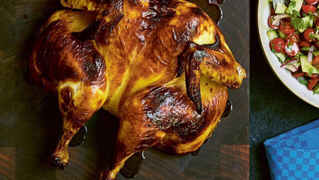<p>Samin Nosrat's joojeh kabob roast chicken. Picture:  Aya Brackett/PA </p>